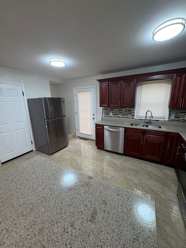 Building Photo - Cozy 3 Bedroom / 2 Bath Updated Home with Large Fenced Yard and Brand-New Multi-Level Deck