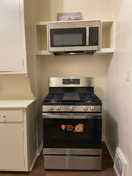 Brand new stove and microwave with hood - 795 N 2nd St