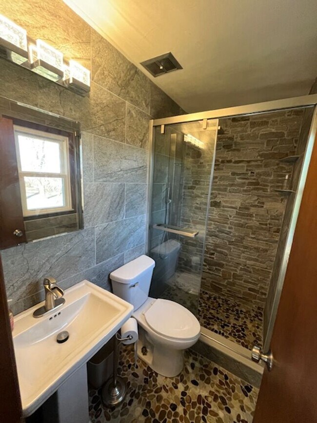 Building Photo - Spacious, Fully Updated Home with Walkout Basement on a Mature Lot