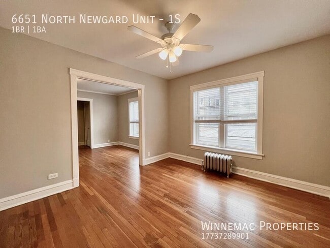 Building Photo - 6651 N Newgard Ave