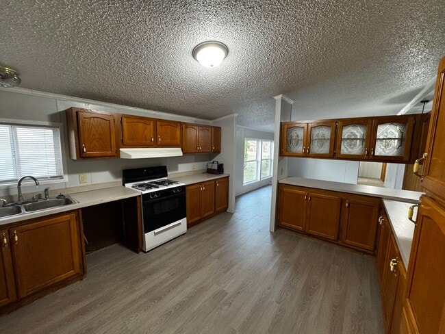 Building Photo - Very large yard great location a nice older doublewide Home