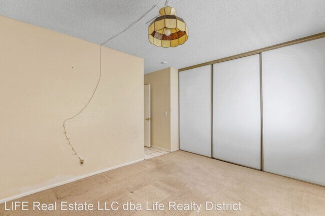 Building Photo - 3 br, 2 bath House - 4795 Woodlake Ave.