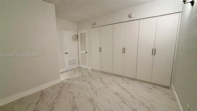 Building Photo - 19380 Collins Ave