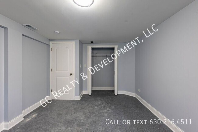 Building Photo - 6433 S Vernon Ave