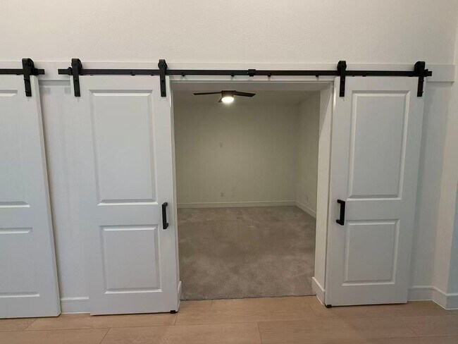 Building Photo - Move-in ready and like-new! Washer, dryer, and refrigerator Included.