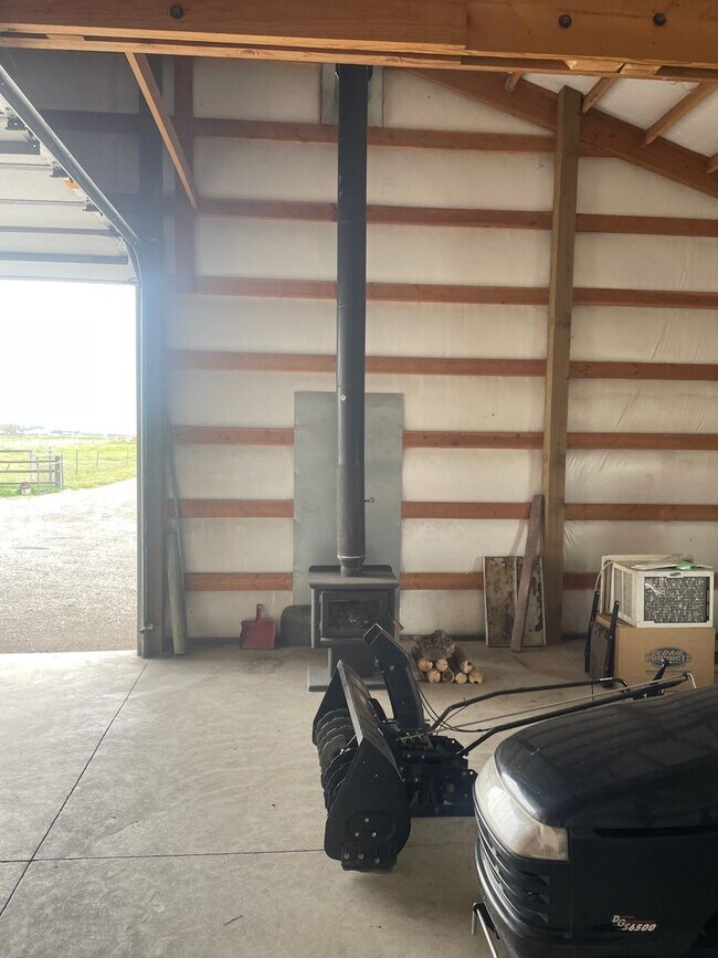 Building Photo - Charming Log Home For Rent with Large Shop & Spacious Yard