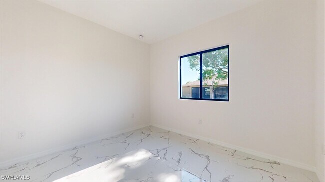 Building Photo - 2310 NW 26th Pl