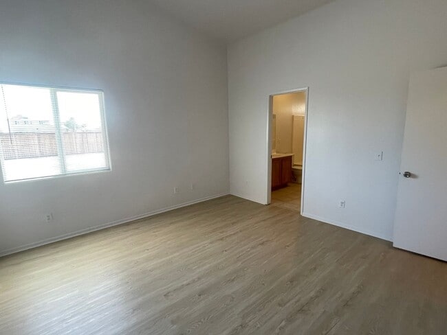 Building Photo - Adelanto Home-3 Bedrooms,2 Bathrooms, Laminate Floors, Indoor Laundry Room, Large Back Yard