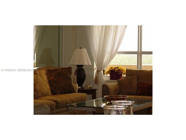 Building Photo - 10185 Collins Ave