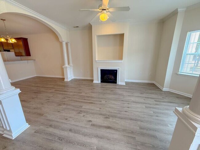 Building Photo - Beautifully updated Townhome! New cabinets, granite counter tops, and LVP flooring through downst...