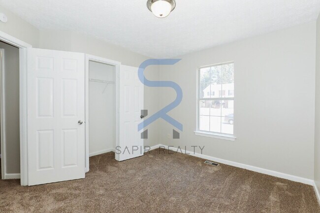 Building Photo - Move in before February 28th and choose your reward: a $250 Amazon Gift Card or a 55" Smart TV!