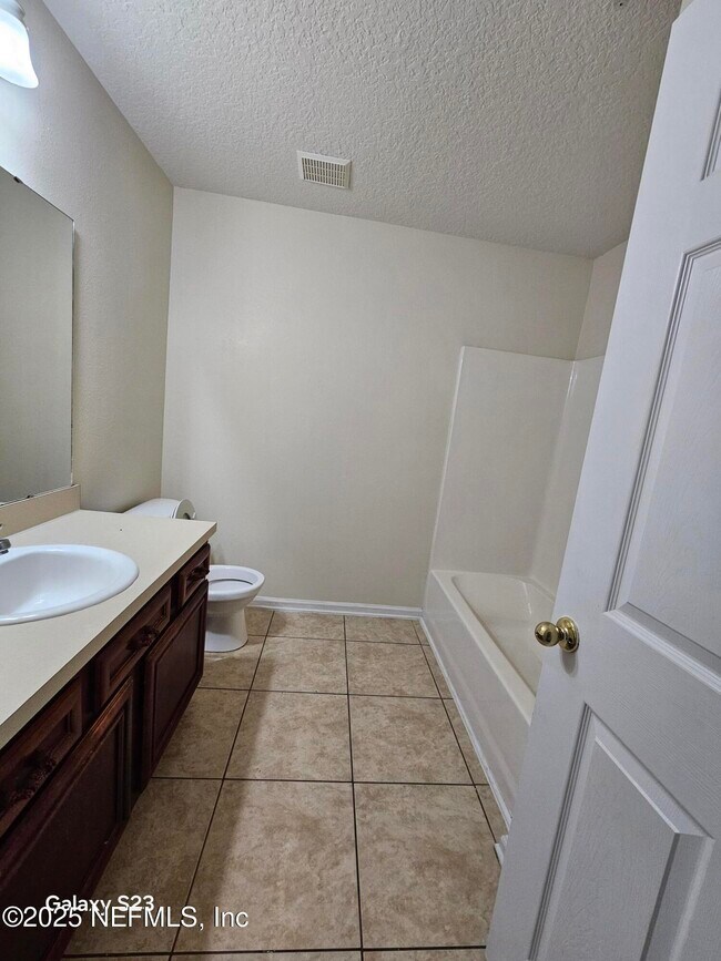 Building Photo - 6965 Ortega Woods Dr
