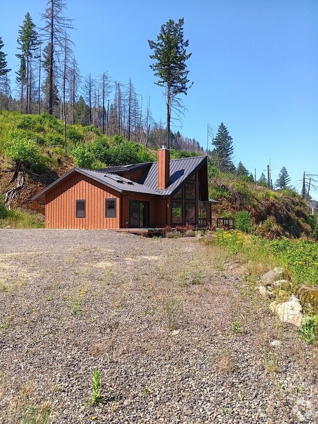 Building Photo - Beautiful Chalet Style Riverfront Property...