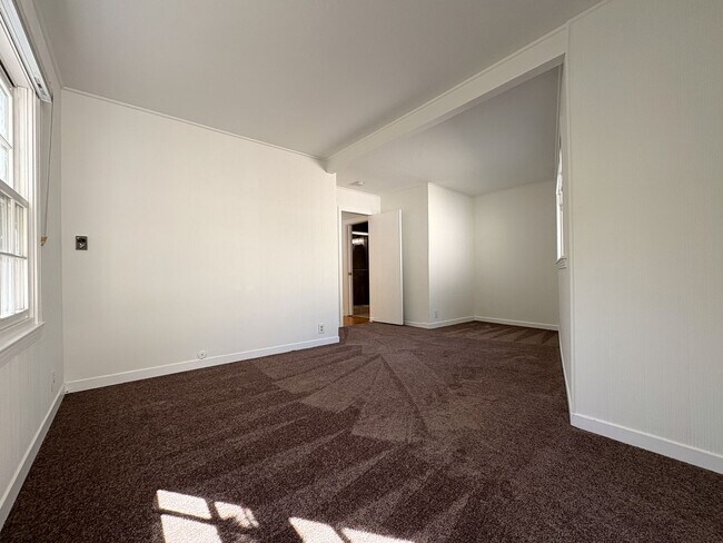 Building Photo - Charming Updated 4BR Home on Prime Corner ...