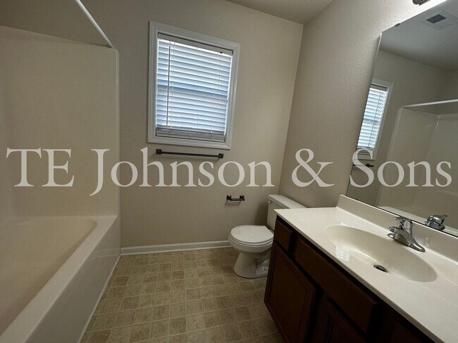 Building Photo - Spacious 3 Bedroom Home with Primary Suite on Main, Gas Fireplace & Patio in Advance!