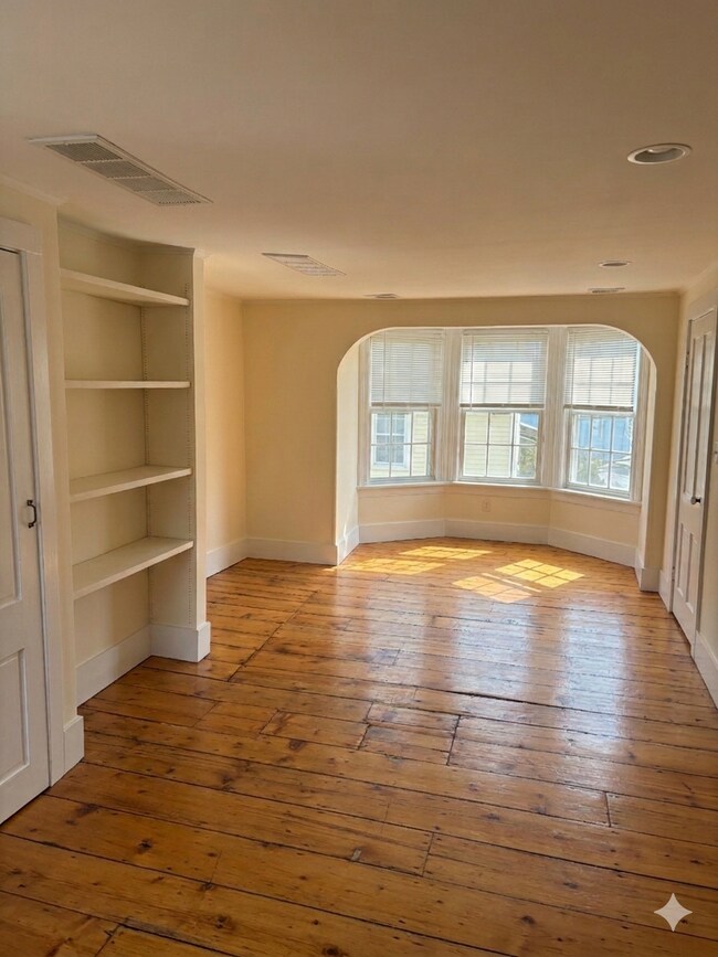 Sunny living room with built in shelves - 39 S Finley Ave