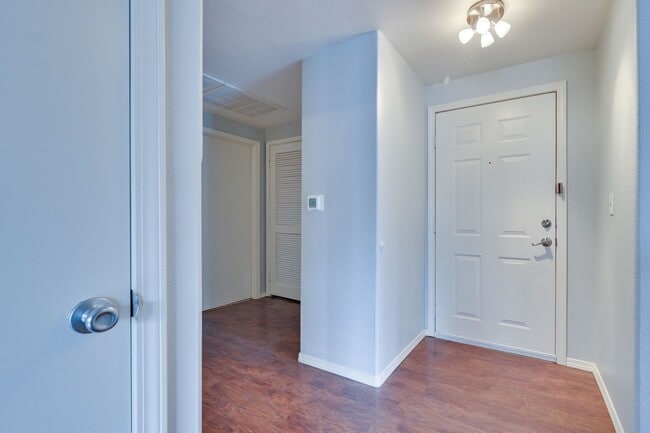 Building Photo - NW!! Gated!!! Clubhouse!!!Community Pool!!! 1st Floor Condo!!! Wood like floors!! No Carpet!!