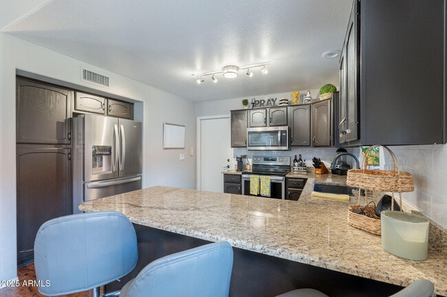 Building Photo - 8846 E Windrose Dr