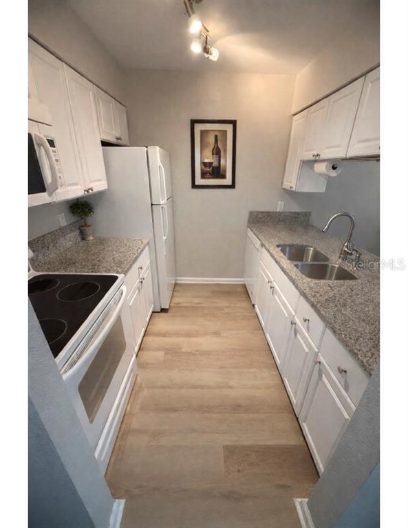 Building Photo - 304 S Habana Ave