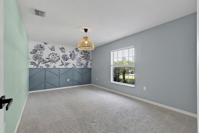 Building Photo - Modern 4-Bedroom, 3-Bath Home with Private In-Law Suite – Palm Coast, FL