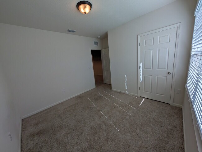 Building Photo - Modern 4-Bedroom Home with Large Backyard in Quiet SW Palm Bay – Available Mid-June