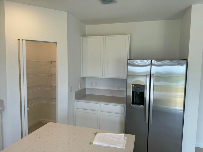 Building Photo - 10856 NW Everbreeze Dr