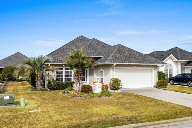 Building Photo - Live the Coastal Lifestyle in This Cypress Keys Beauty!
