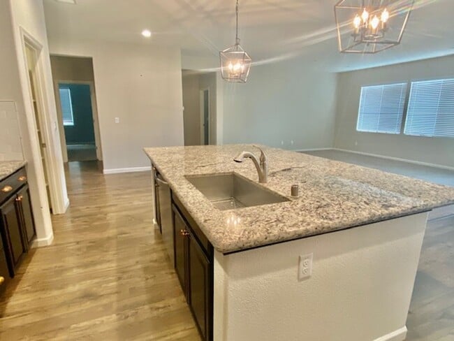 Building Photo - ALMOST NEW, UNIQUE 4 BEDROOM, 3 BATH, 2 CA...