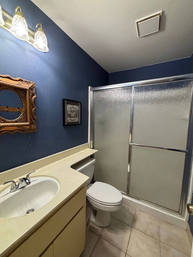 Building Photo - Beautiful Single-Story Townhome on Corner Lot with Private Courtyard & 2-Car Garage