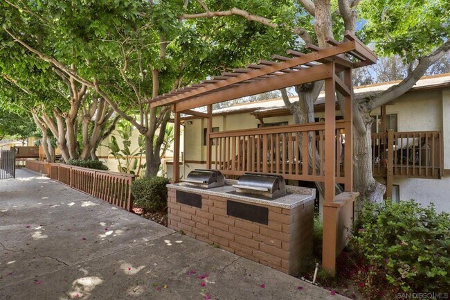 Building Photo - Comfortable, Convenient Living In Premier Mission Valley Complex