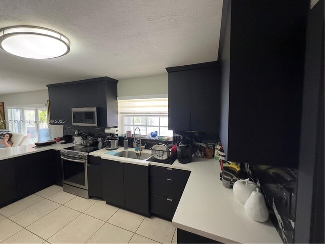 Building Photo - 10600 SW 146th Ct
