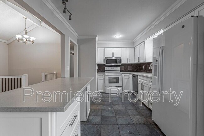 Building Photo - 13032 W 102nd Terrace