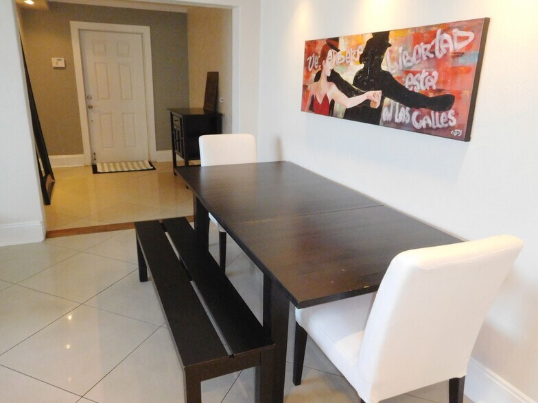 Dining area and apt entry - 112 S Federal Hwy