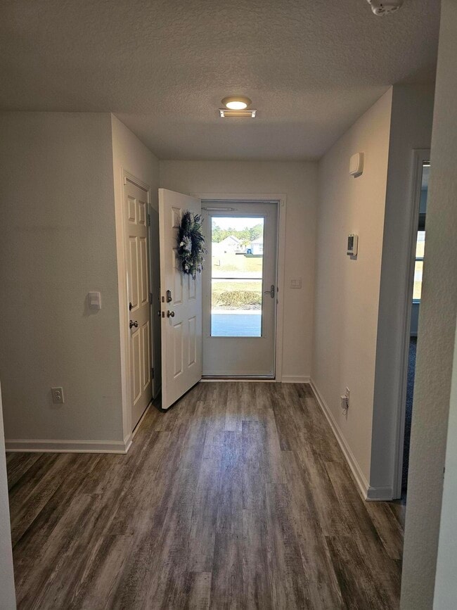 Building Photo - 410 Sweet Blossom Bend