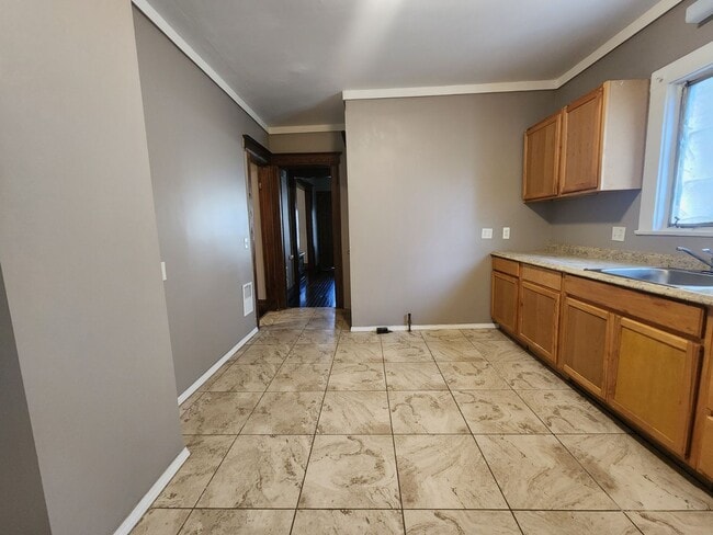 Building Photo - Four Bedroom, Two Bathroom Single Family Home!