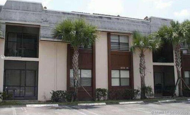 Building Photo - 10724 Royal Palm Blvd