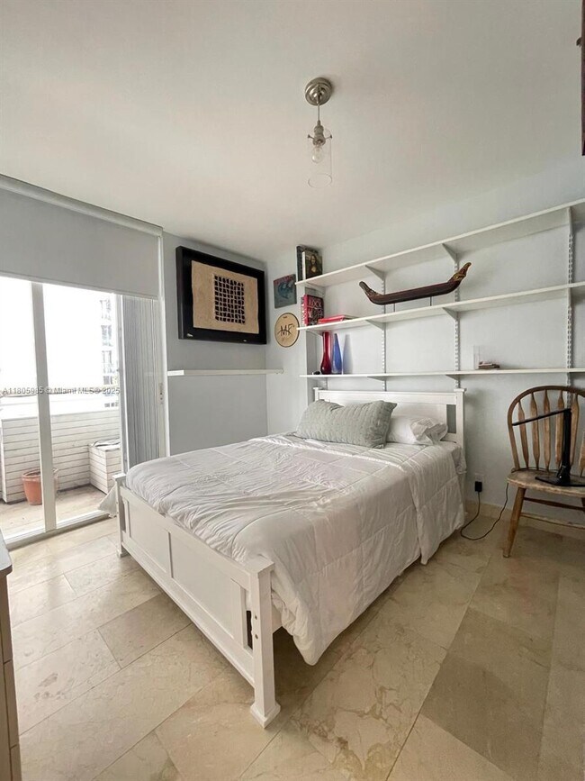 Building Photo - 8911 Collins Ave