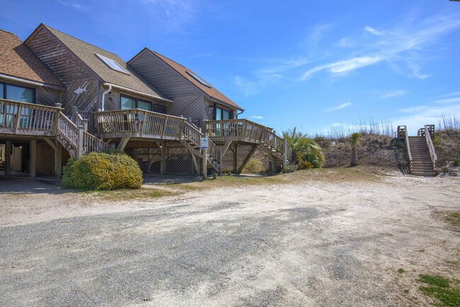 Building Photo - FURNISHED OFF-SEASON MONTHLY RENTAL-STARTI...