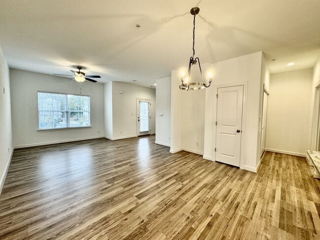 Building Photo - Practically New & Available NOW! Americana Luxury Townhomes! Pet Friendly! Attached Garage! All A...