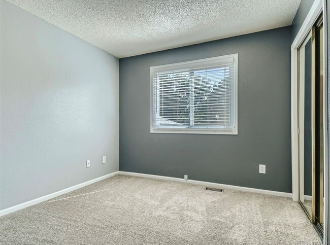 Building Photo - 1293 E 97th Ave