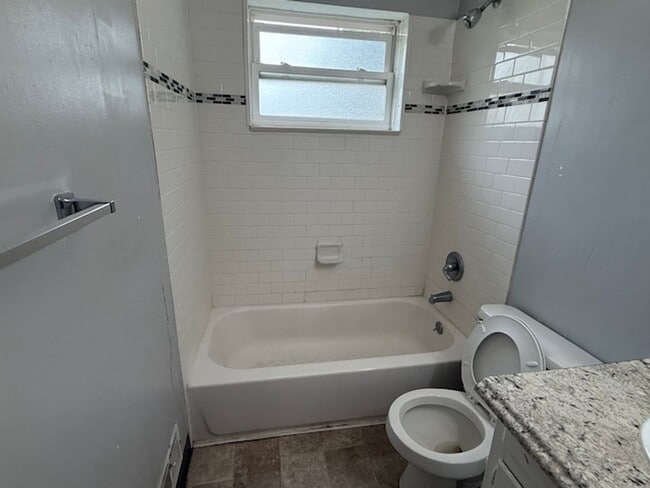 Building Photo - BRICK HOME WITH FINISHED BASEMENT