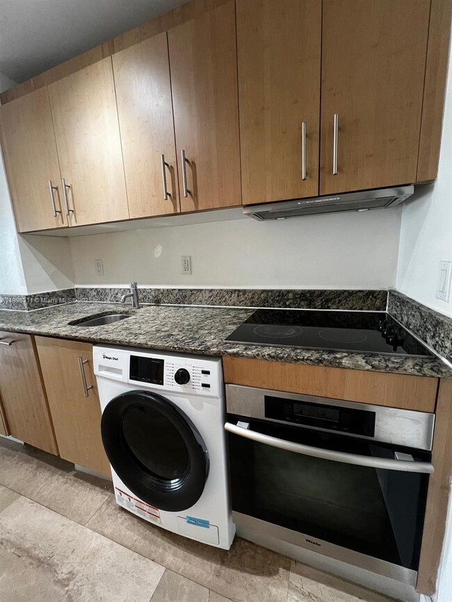 Building Photo - 10275 Collins Ave