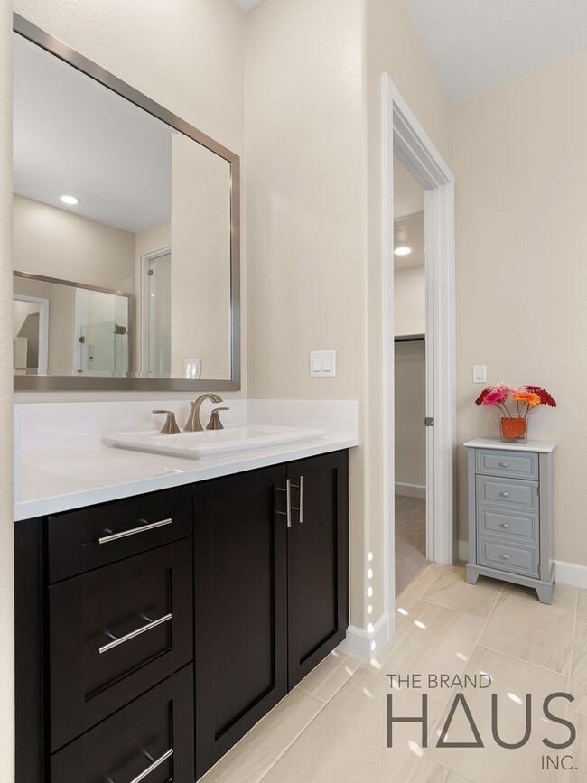 Building Photo - Rare 55+ Gated Travata Community – Bedrooms on Main + Loft + Resort-Style Amenities!