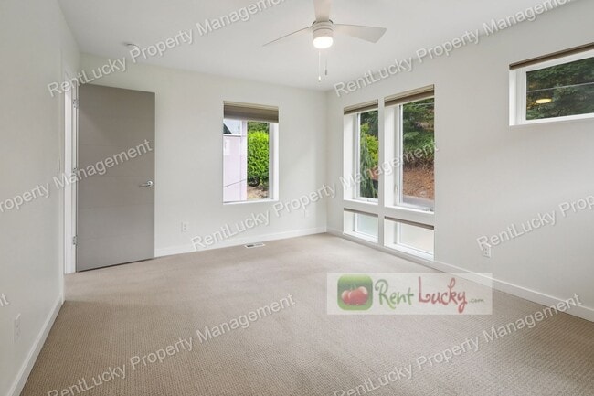 Building Photo - Immaculate and LARGE 4-Bedroom Home in Unb...