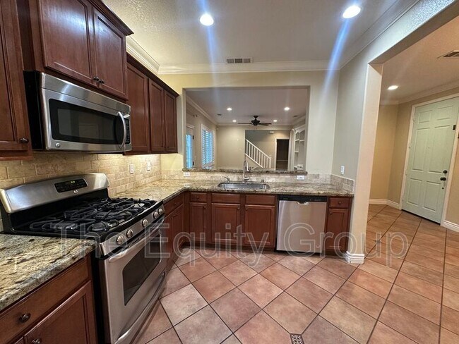 Building Photo - 3842 W Buena Vista Ave