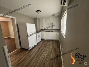 Building Photo - New Management, New Look, New You!