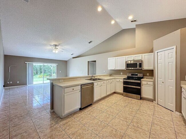 Building Photo - Poinciana single family home in Village 7,...
