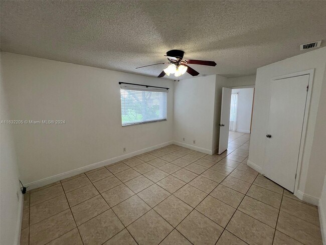 Building Photo - 3410 Pinewalk Dr N
