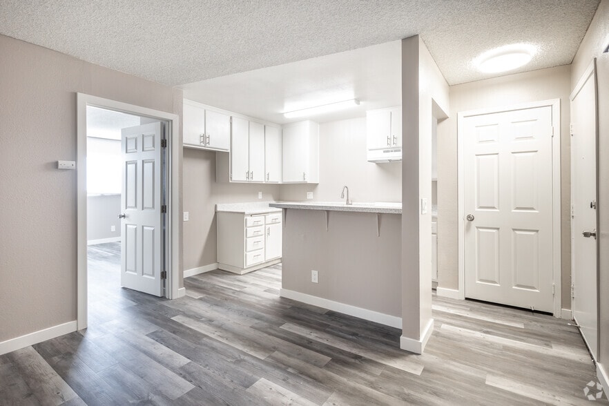 1BR, 1BA - 600SF - Living Space & Dining - Fountain Creek Apartments