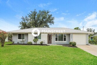 Building Photo - 3 Bedroom Pet-Friendly Home in PORT CHARLOTTE, FL with Main Street Renewal